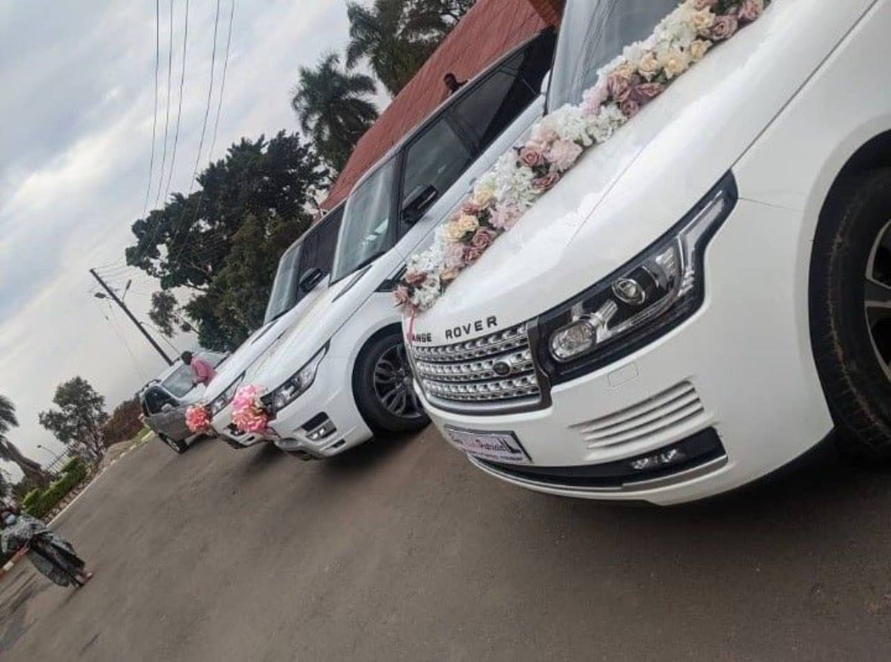 Wedding convoy with decorated luxury vehicles